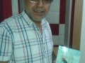 Featured in TPD, Fuad Alrazim receives a copy of the book #TPD.jpg