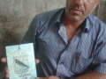 Well-known former Palestinian hunger-striker Ayman Sharawna receives a copy of TPD. Alsharawneh was deported to Gaza.jpg