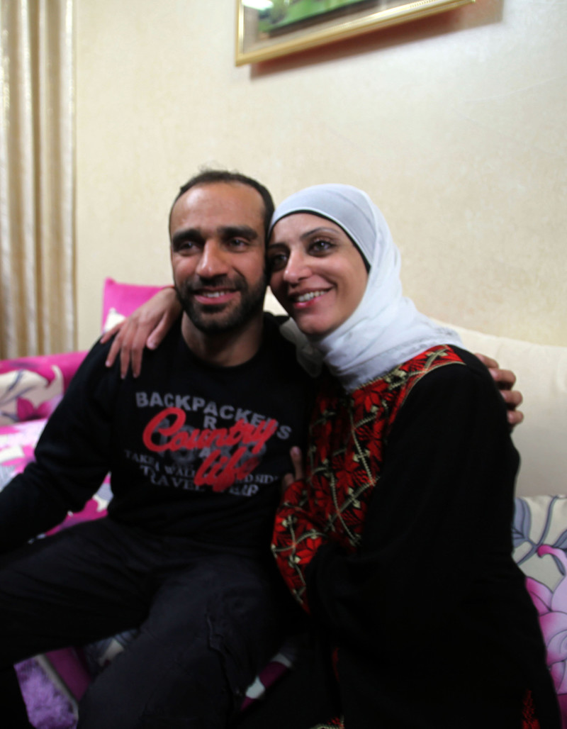 Shireen Issawi with Samer after his release from prison, December 2013. Saeed Qaq APA images