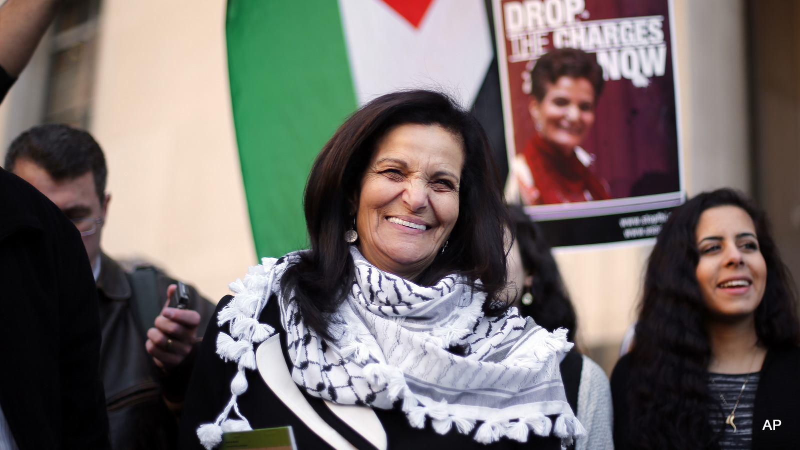 Rasmea Odeh smiles after leaving federal court in Detroit Thursday, March 12, 2015.