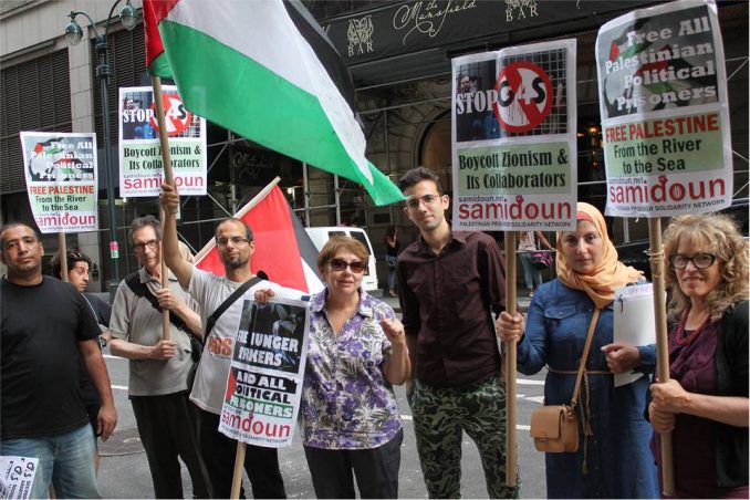 Palestinian prisoners’ and BDS movements celebrated international victory over G4S and Israeli state terror, Dec. 2 in New York City.
