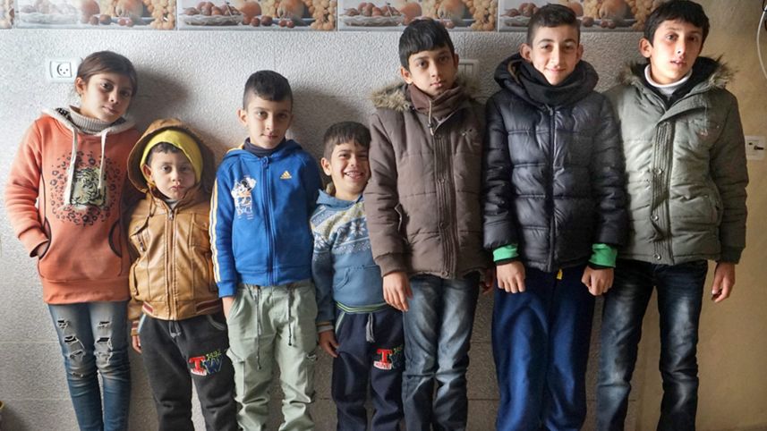 Kadum's juvenile lineup, from left: Shahad, Mohammed, Muaman, Mahmoud, Maliq, Khaled, Tariq. Since the protests began, 85 residents, 11 of them children, have been hit by live bullets. Alex Levac read more: http://www.haaretz.com/israel-news/.premium-1.764648