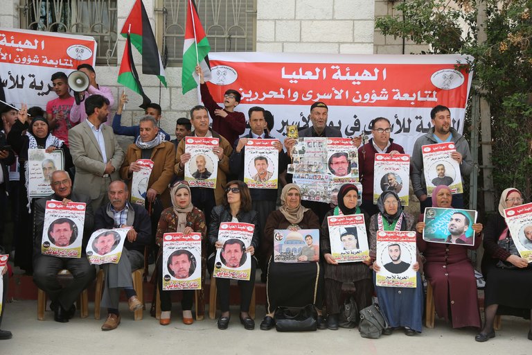 Photos of prisoners during a demonstration demanding the release of the Palestinians held in Israeli prisons, in Ramallah, West Bank, this month. Credit Issam Rimawi/Anadolu Agency, via Getty Images