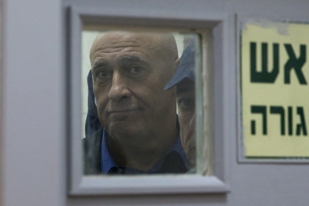 Arab Israeli lawmaker Basel Ghattas appears at the Magistrate Court in Rishon Letzion, central Israel on December 26, 2016.  Israeli police said they arrested an Arab lawmaker whose immunity has been lifted after he was suspected of secretly giving cellphones to two Palestinian high security prisoners.  / AFP PHOTO / POOL / Ariel SCHALIT