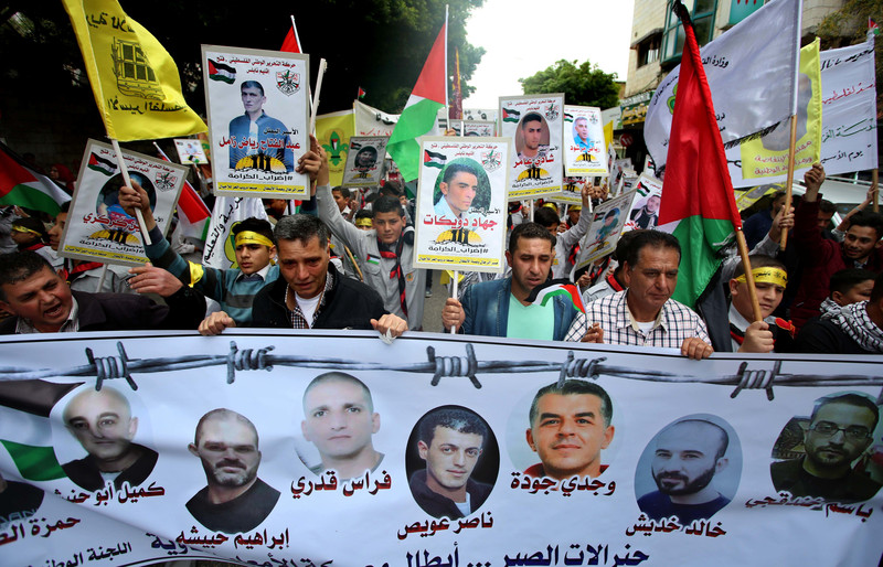 Palestinians rally in solidarity with prisoners on hunger strike in the West Bank city of Nablus, 23 April. Ayman Ameen APA images