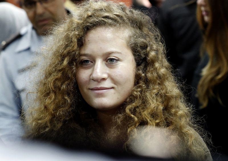 Ahed Tamimi, seen here in a file picture, was arrested in the early hours of December 19 (AFP Photo/THOMAS COEX)