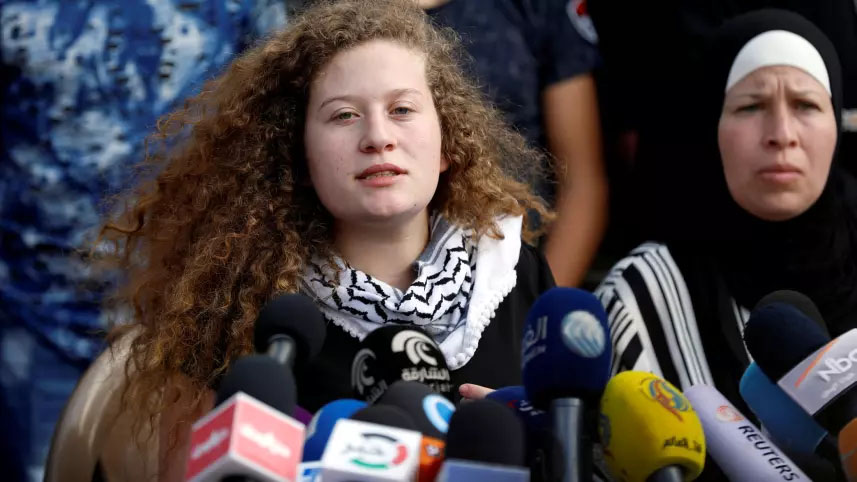 Palestinian teenager Ahed Tamimi speaks during a news conference after she was released from an Israeli prison, in the Nabi Saleh village in the West Bank July 29, 2018. REUTERS/Mohamad Torokman