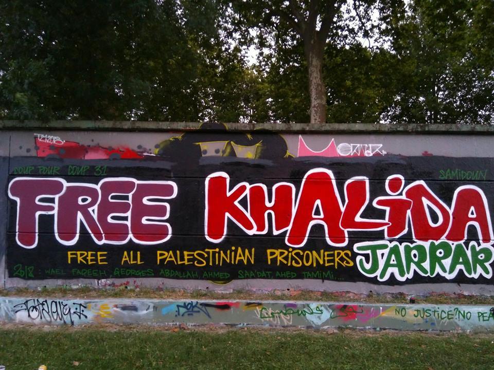 Graffiti in France urging Khalida’s release. Photo: Coup Pour Coup 31