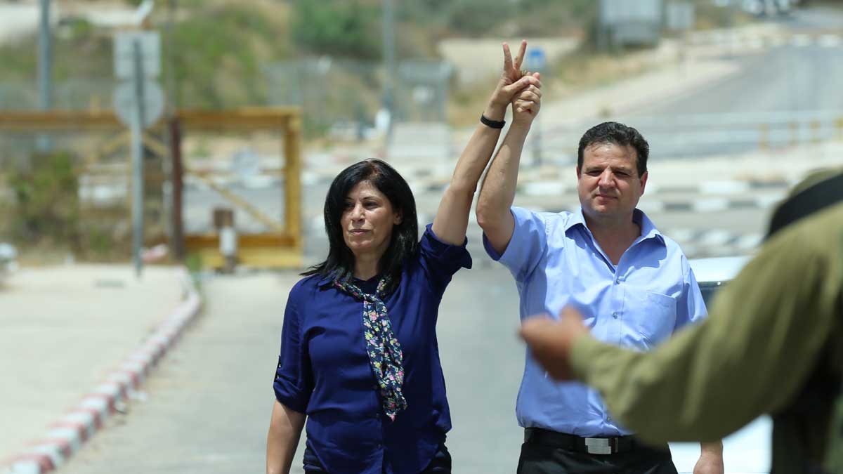 Palestinian parliament member Khalida Jarrar with Arab-Israeli Knesset member Ayman Odeh after her release from Israeli prison on June 3, 2016. (Zher333/CC BY-SA 4.0)