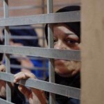 This file picture shows Palestinian women behind bars at a detention center in the Israeli occupied territories. (Photo via social media)